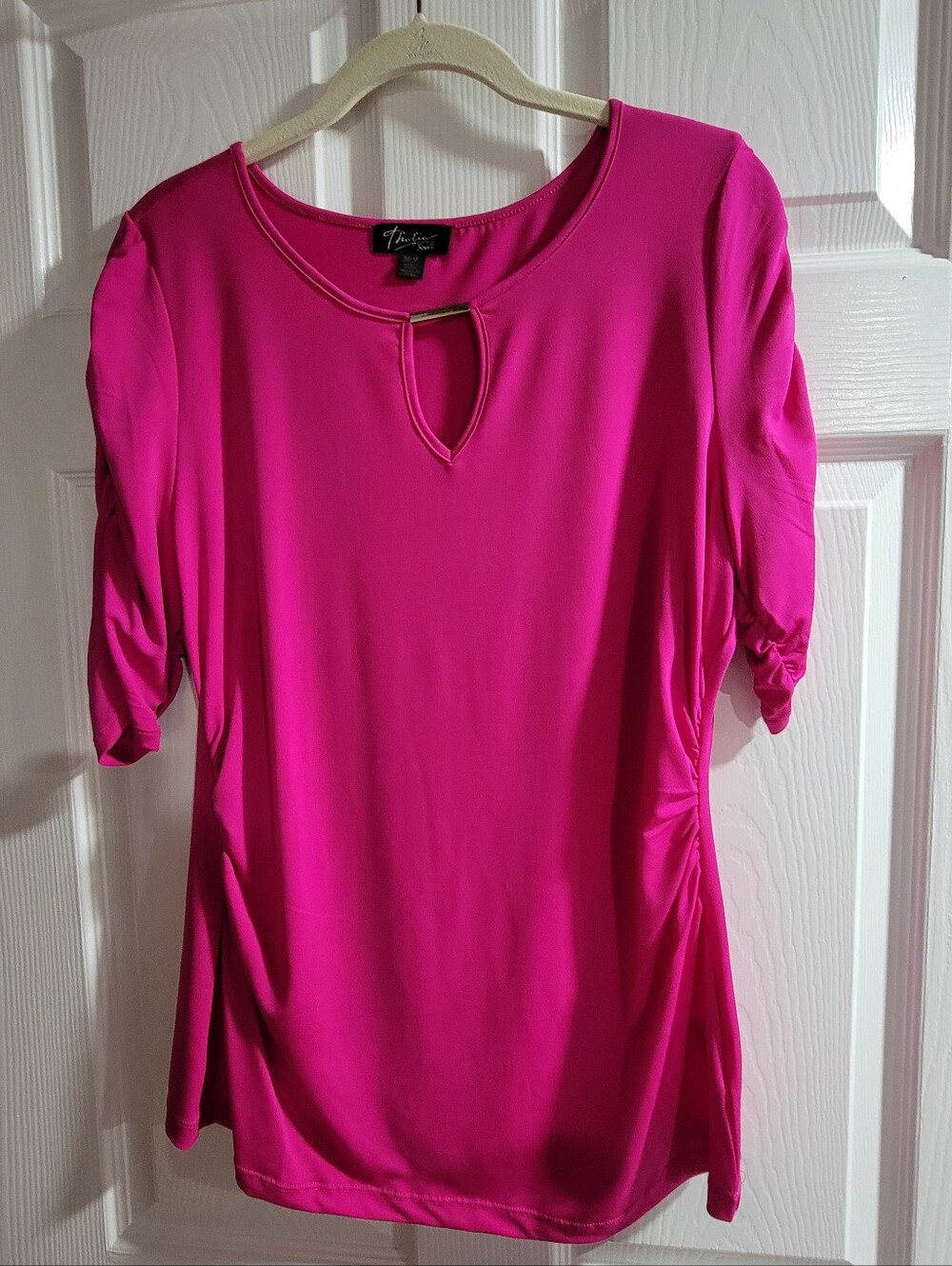 Vibrant pink Thalia Sodi top is a size medium.